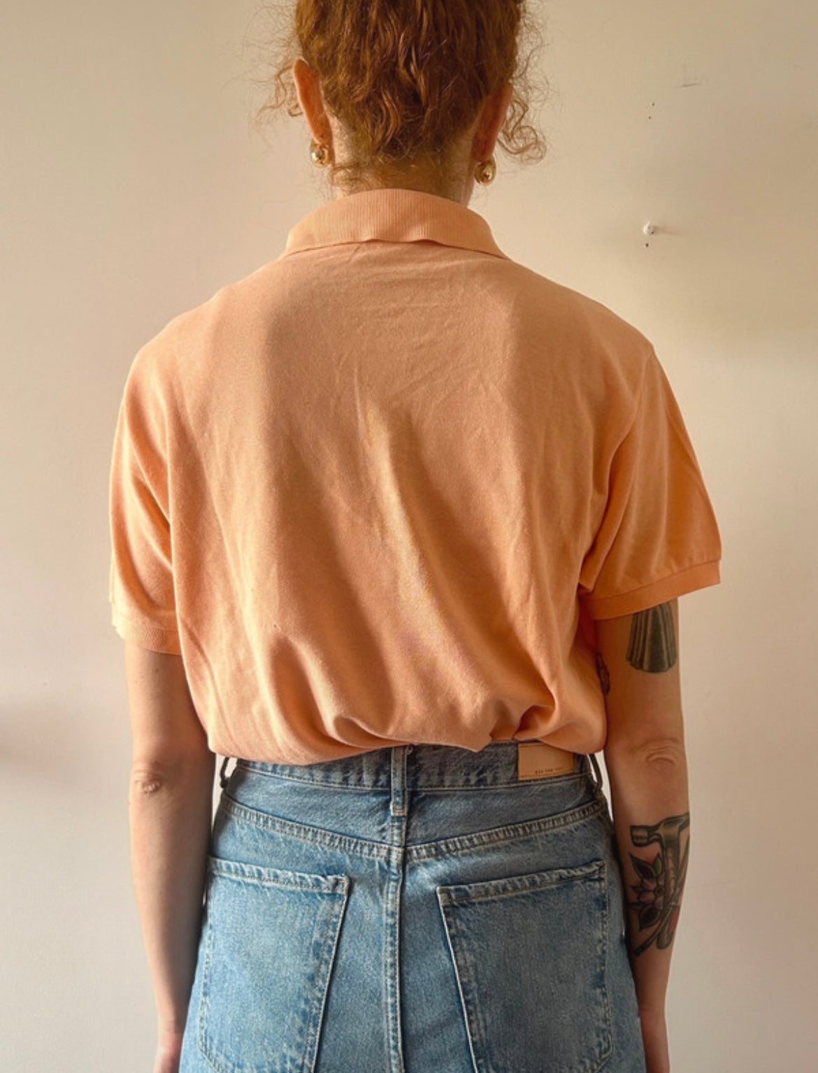 Polo Lacoste albicocca