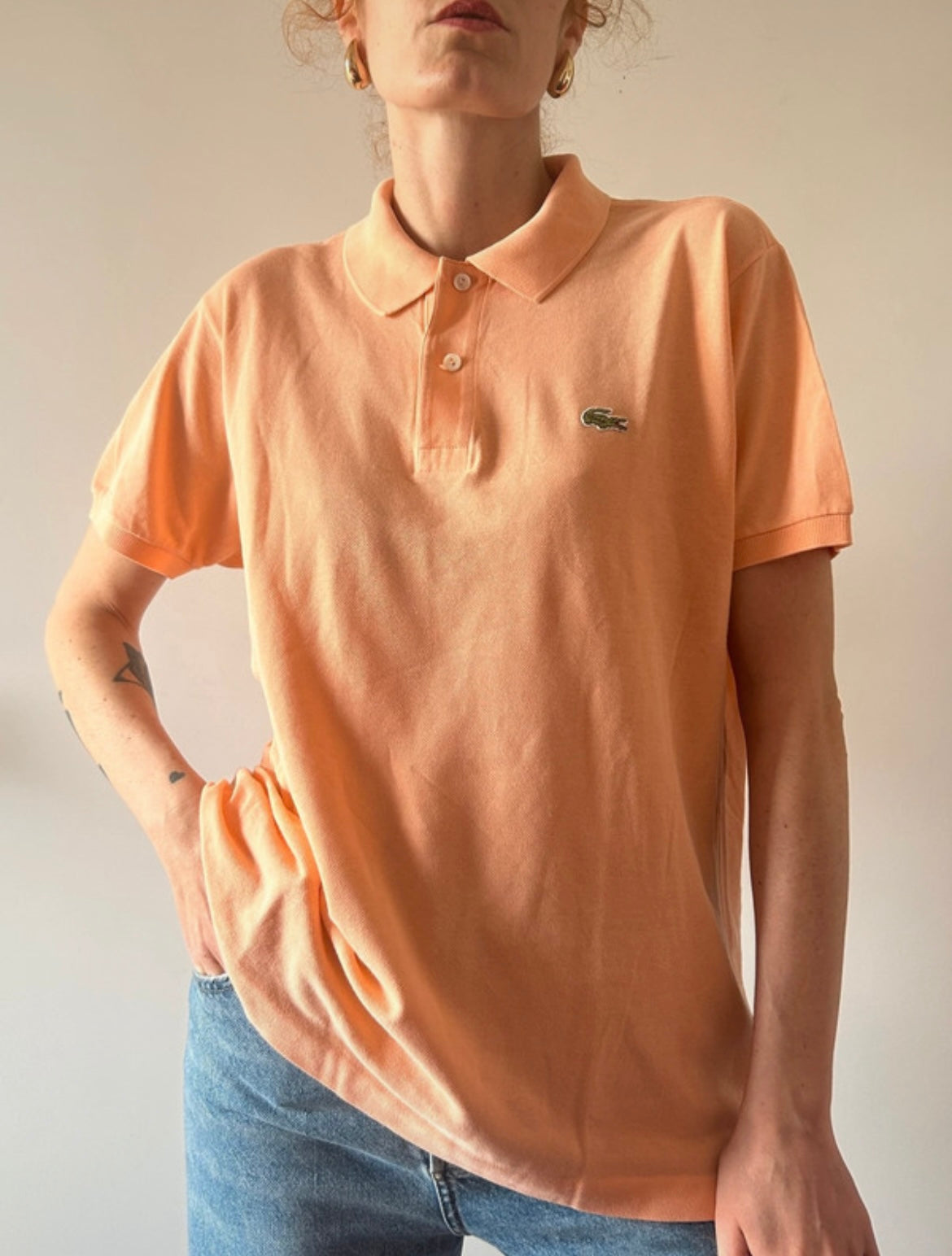 Polo Lacoste albicocca